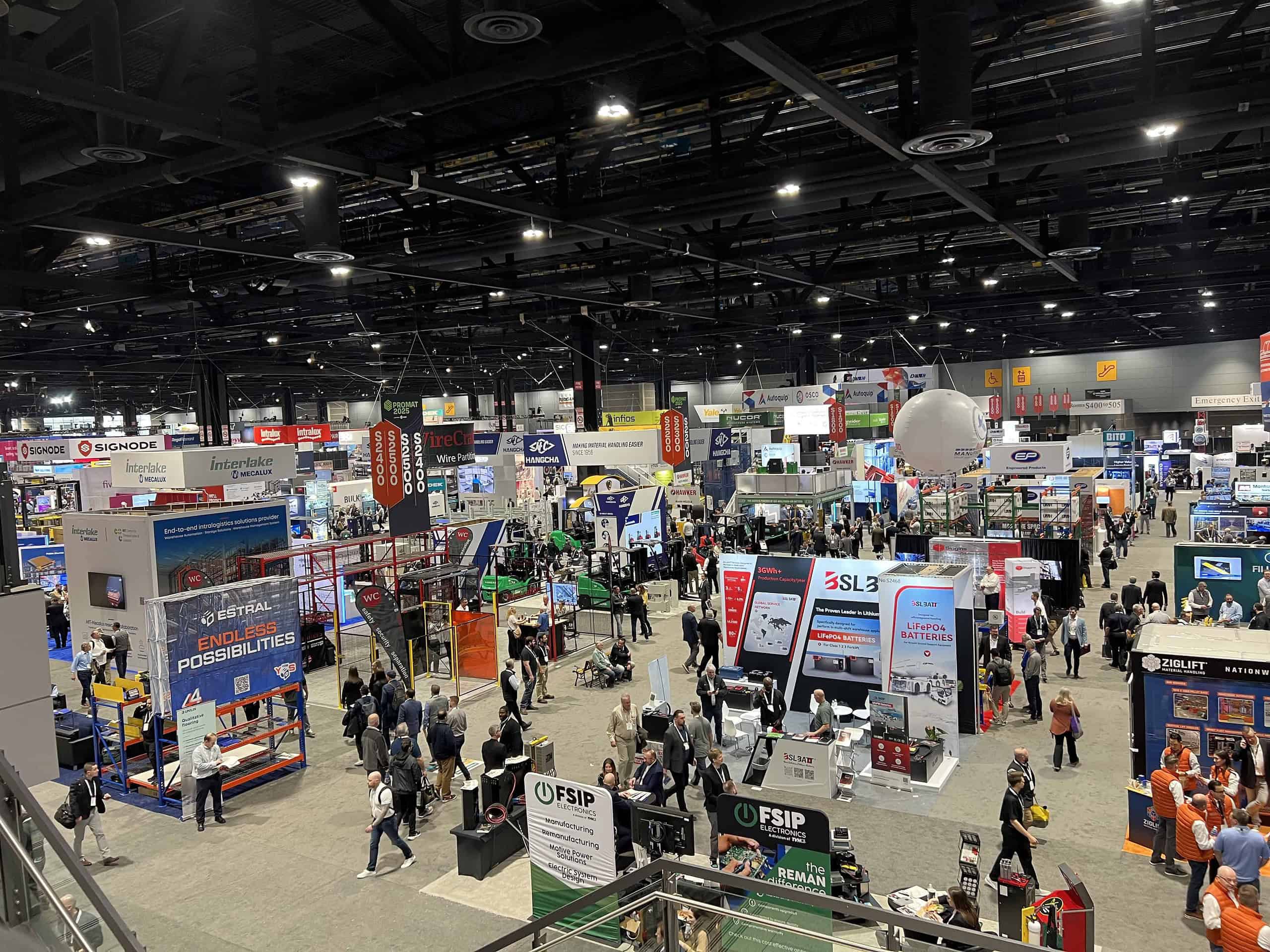 Trade show floor at ProMat 2025 with 1,200 exhibitors and over 50,000 supply chain professionals in attendance.