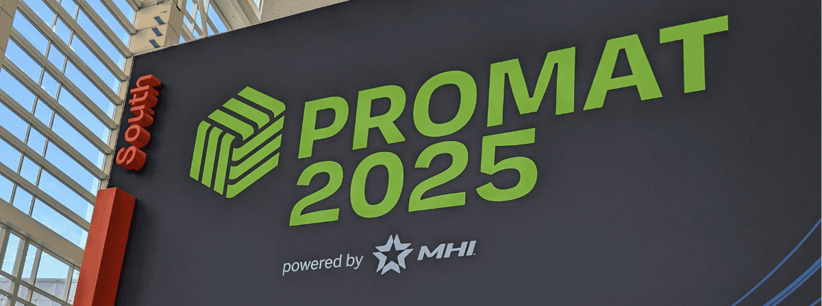 Entrance signage at PROMAT 2025, showcasing the event branding and colorful design elements in the main lobby.