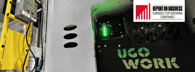Close-up of a UgoWork lithium-ion battery charging in a warehouse, with Canada’s Top Growing Companies badge from The Globe and Mail.