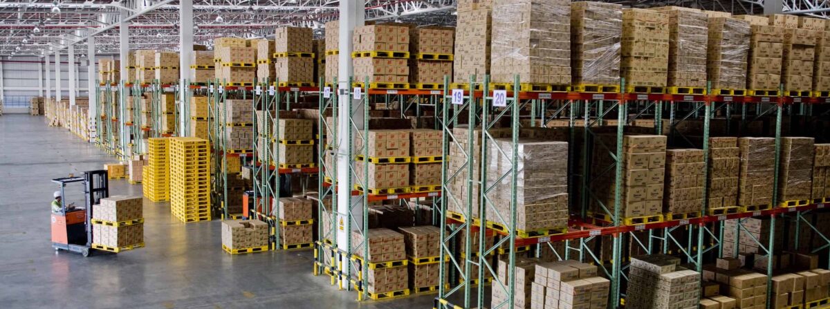 Forklift loader worker driver at warehouse