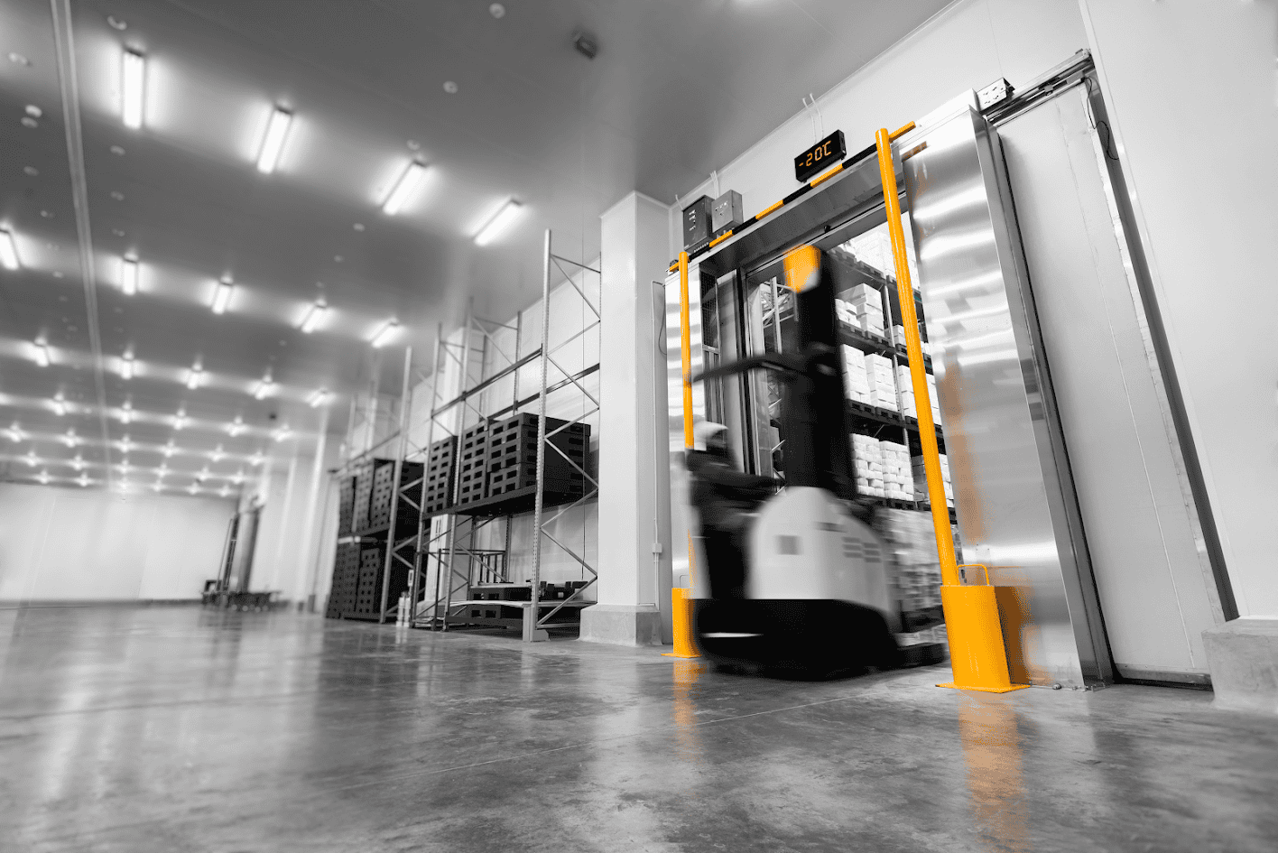 Forklift in action inside a modern warehouse—inventory and stock storage