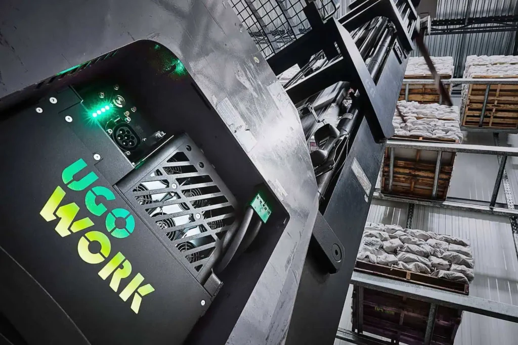 High-capacity UgoWork lithium-ion battery in an industrial warehouse.